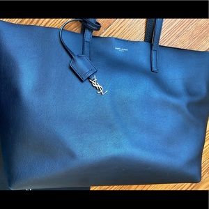 YSL Tote like new 100%authentic. Used one time. Comes with dust bag & wallet
